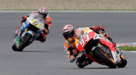 Honda MotoGP rider Marquez of Spain and Honda MotoGP rider Bradl of Germany compete during the second free practice of the Czech Grand Prix in Brno